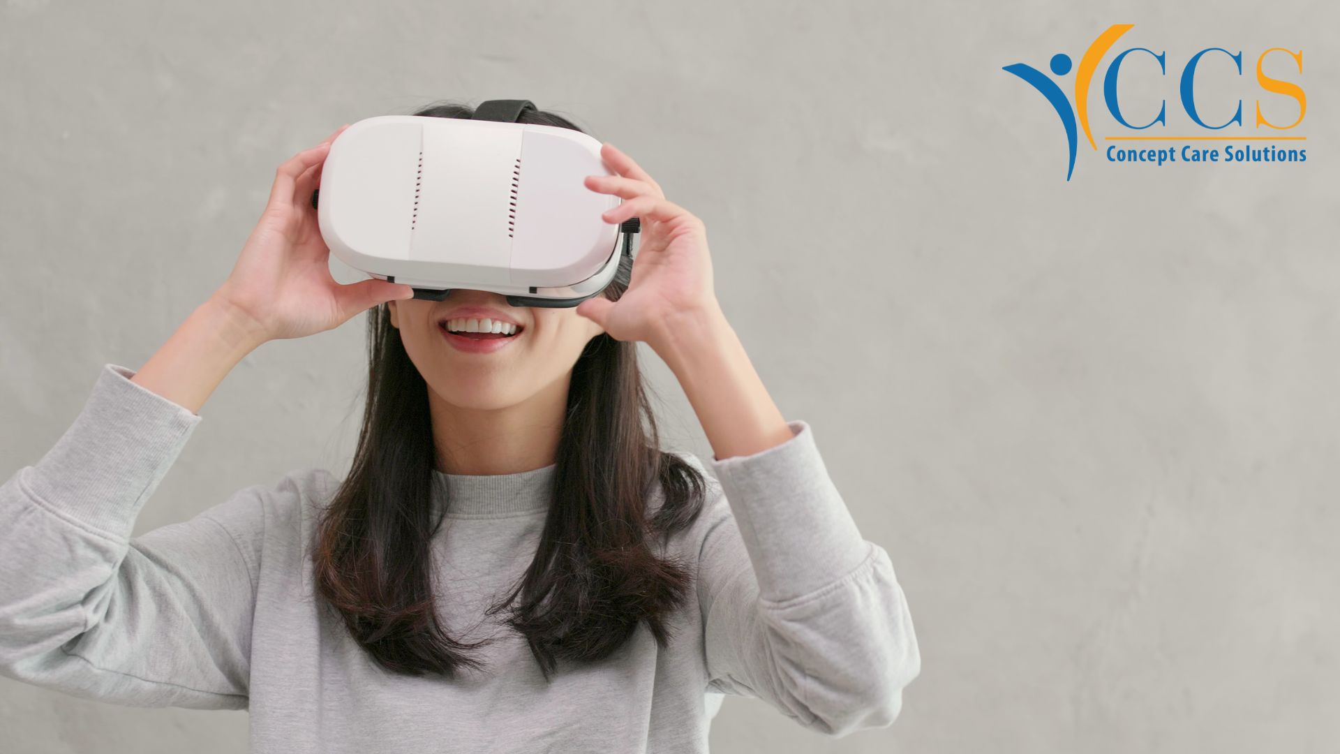 Person wearing a vr headset and smiling